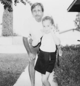 Dad and daughter pose on first day of school 