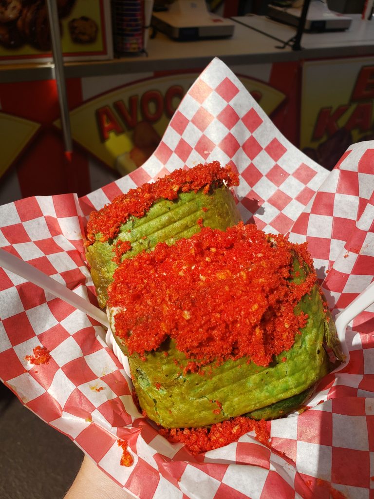 Buffalo Chicken Chimichanga topped with hot Cheetos dust
