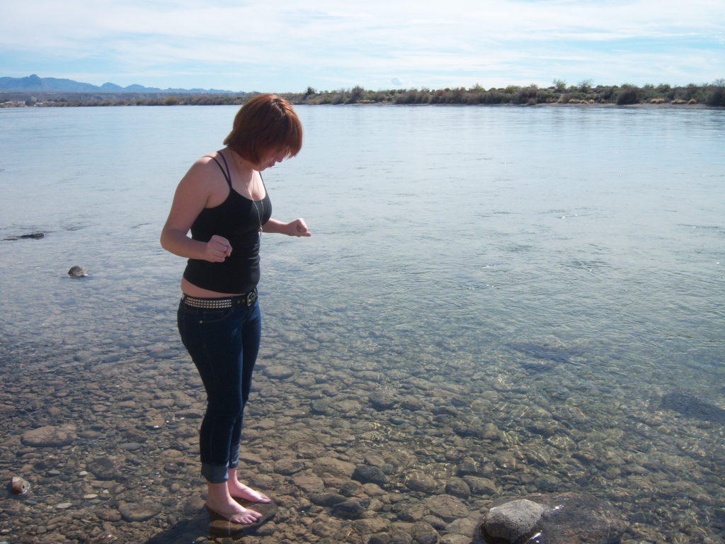 Girl standing in water