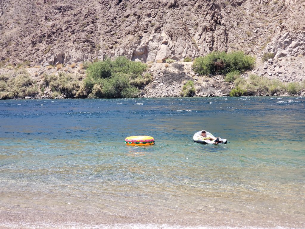 Girl on a raft in the river