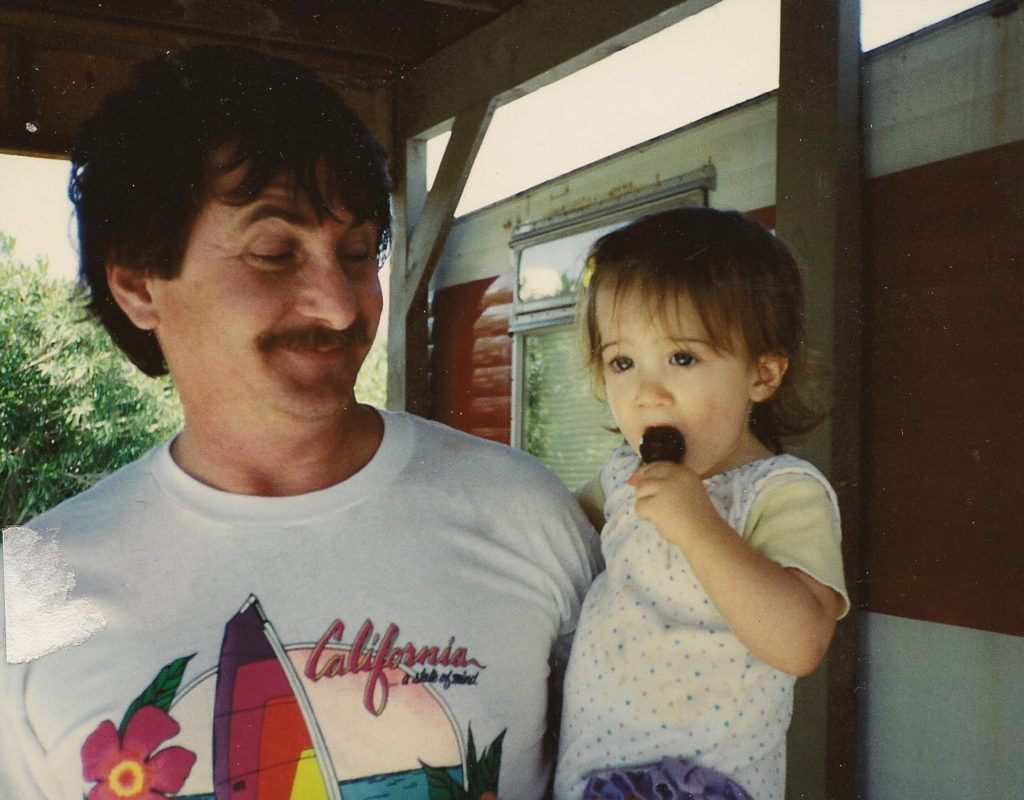 Father holding his baby daughter