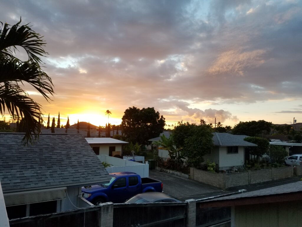 Sunset over houses in Hawaii